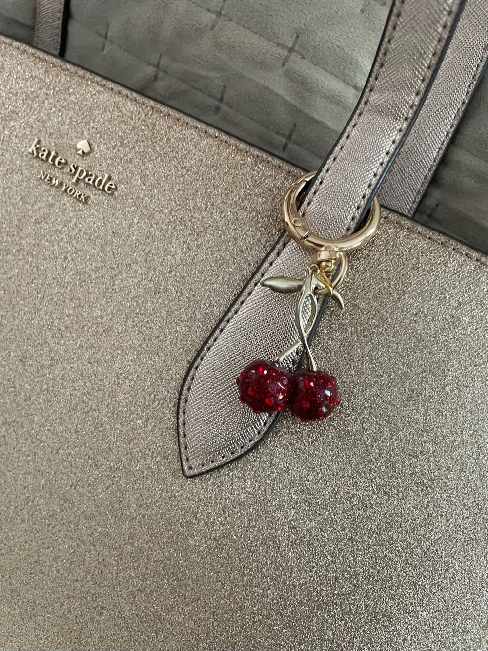 kate spade Metallic Champagne Glitter Tote with Cherry Charm